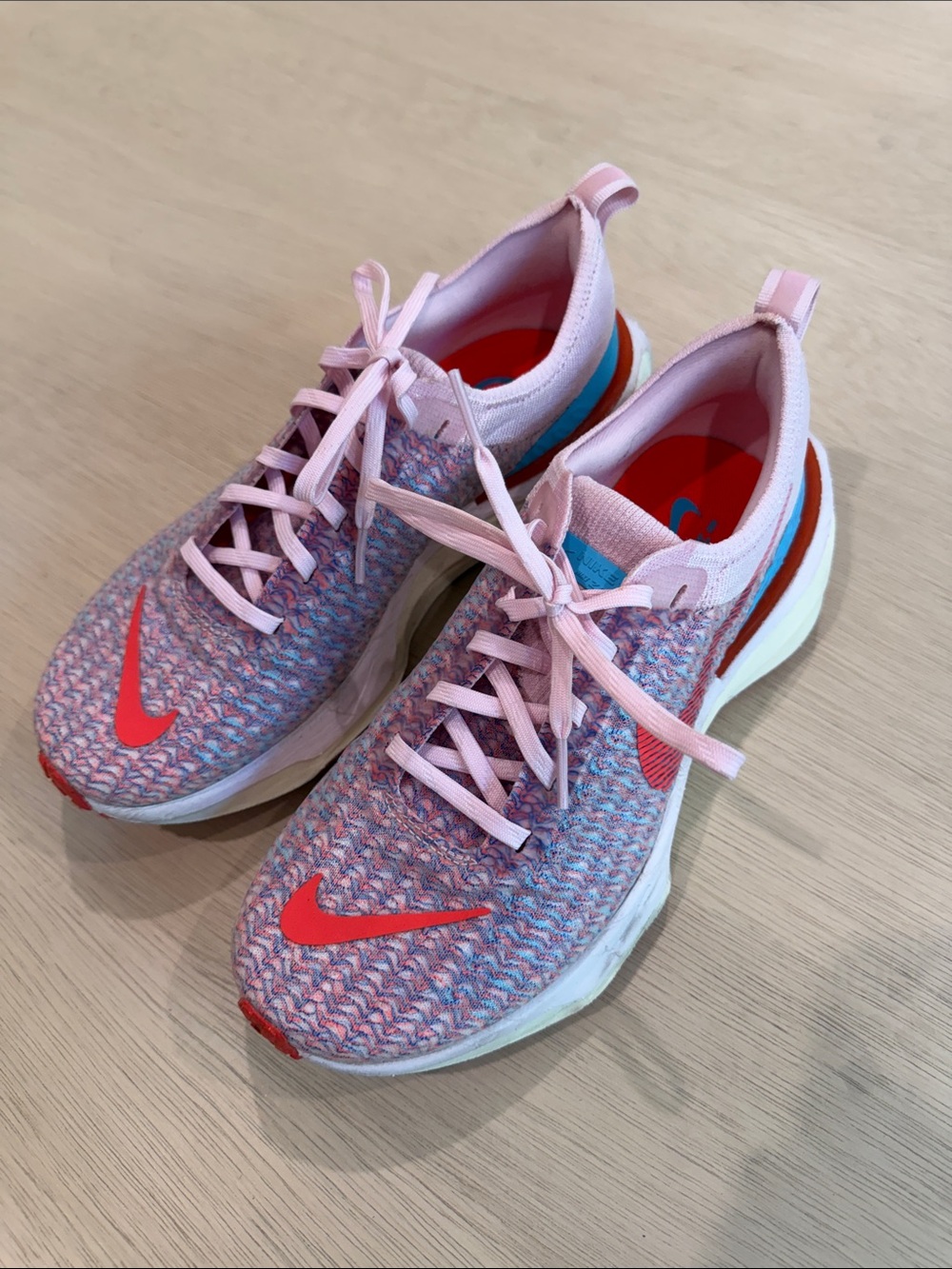 Nike Pink and Coral Flyknit Running Sneakers